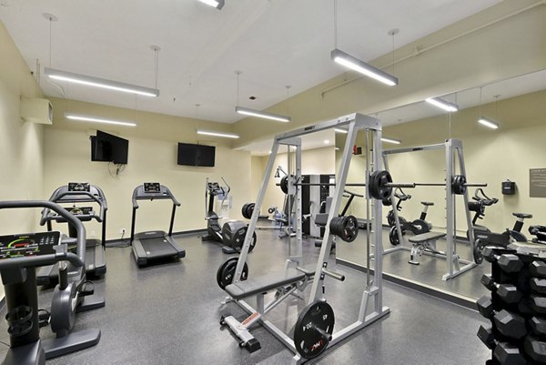 Modern fitness center with state-of-the-art equipment at Nob Hill Tower Apartments, offering a unique workout experience for residents