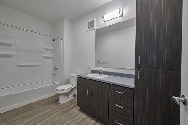Modern bathroom with sleek fixtures in Alpine Vista Apartments, luxury property by Greystar