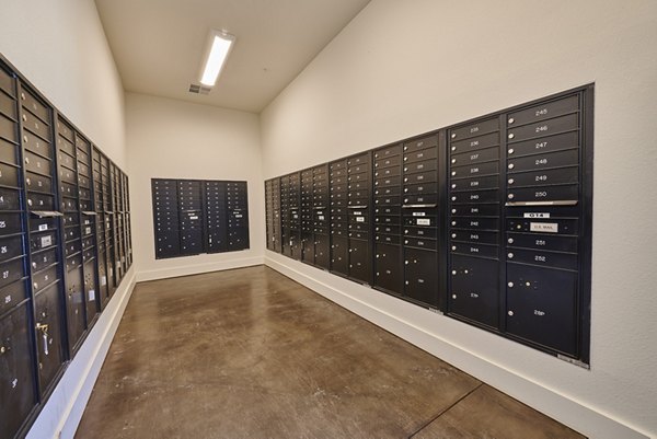 Mail room facility featuring secure parcel lockers at Alpine Vista Apartments