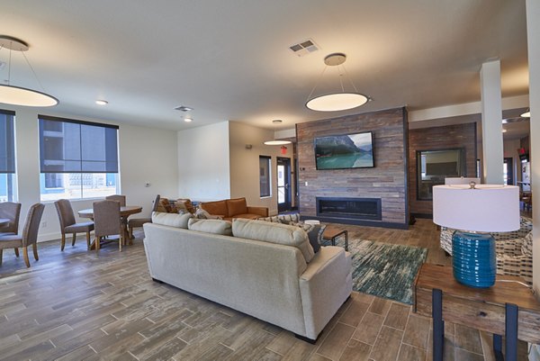Clubhouse featuring modern decor and seating areas at Alpine Vista Apartments