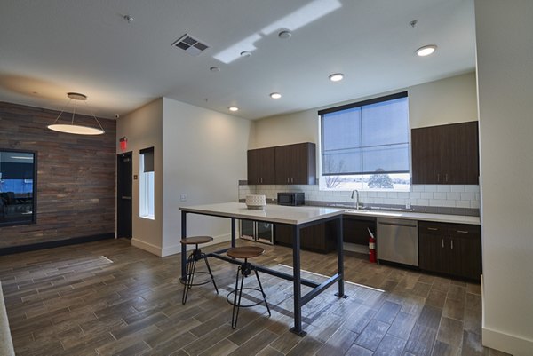 Stylish clubhouse with cozy seating and modern dÃ©cor at Alpine Vista Apartments, offering a luxury living experience