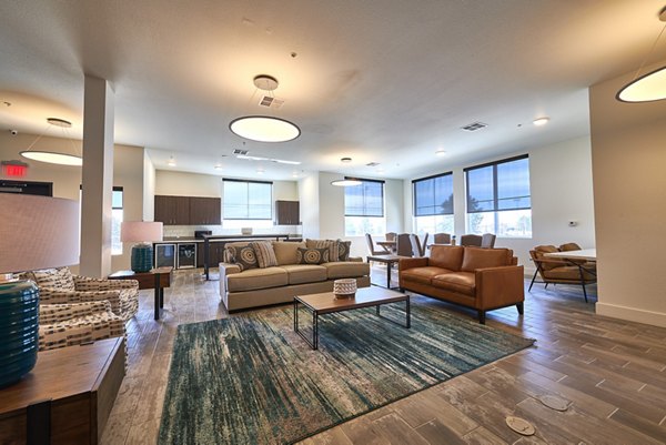 Clubhouse featuring modern design and cozy seating at Alpine Vista Apartments