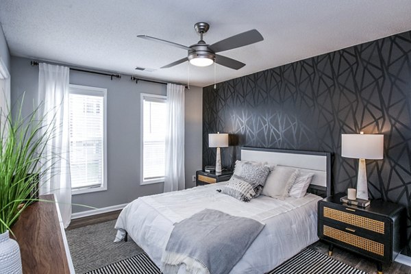 Cozy bedroom with modern decor at Avana Avebury Apartments