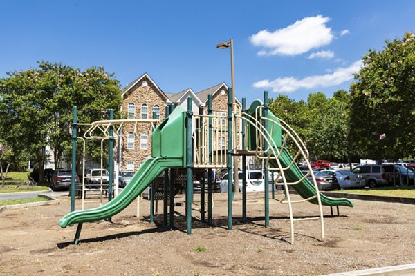 Playground with modern equipment at Avana Avebury Apartments for active outdoor fun