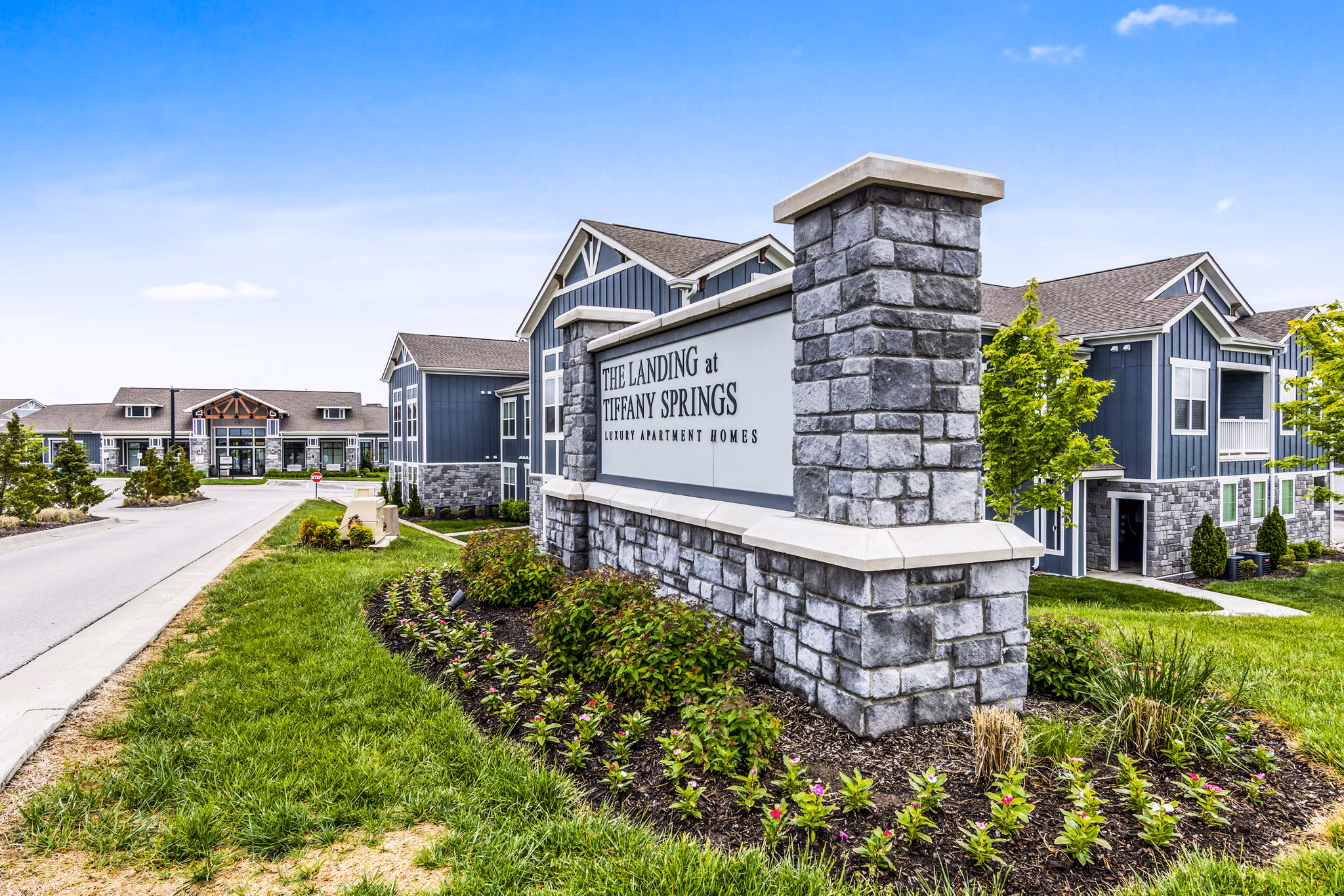 The Landing at Tiffany Springs: Contemporary signage at luxury apartment community