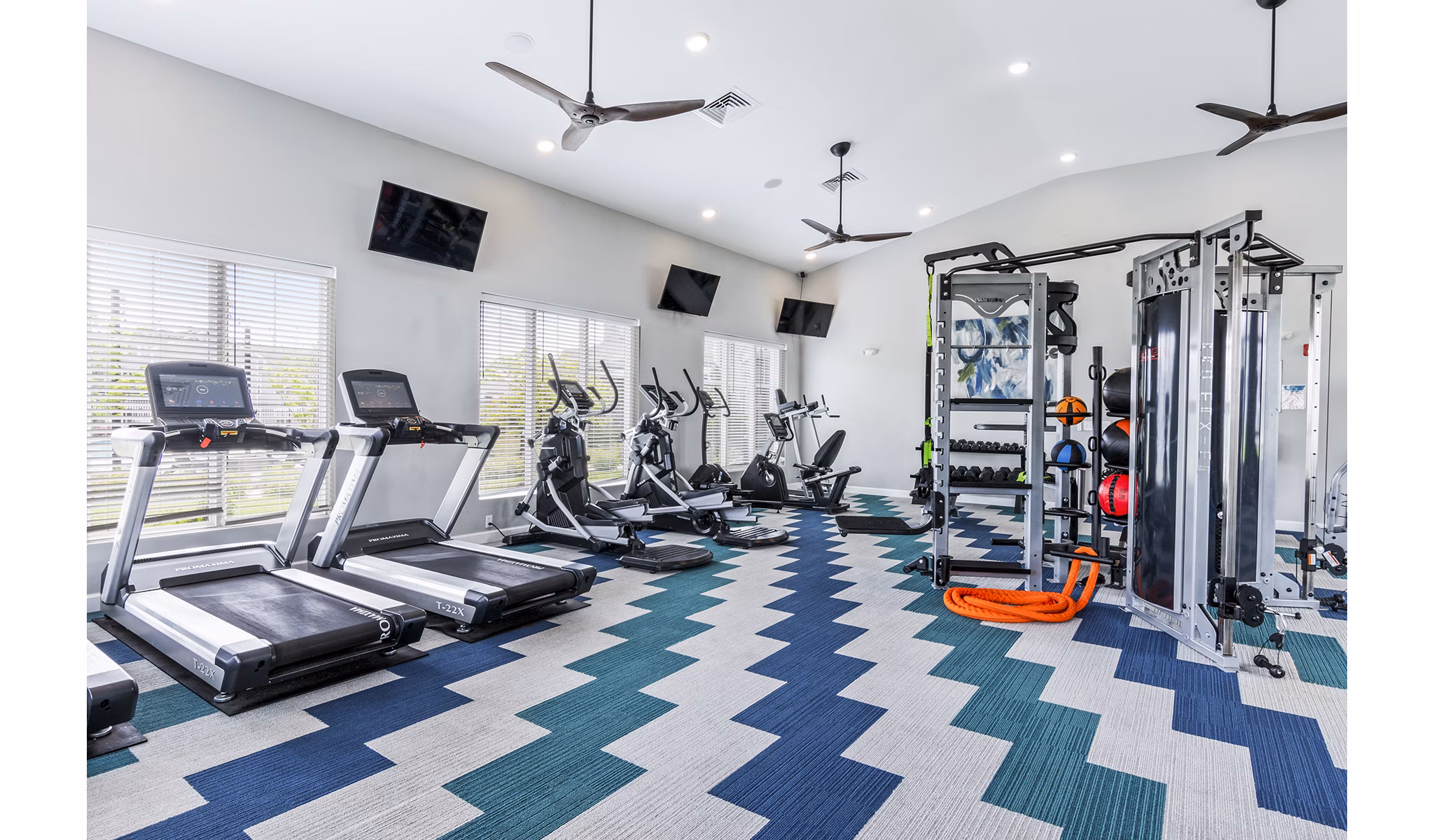 The Landing at Tiffany Springs: Fully equipped fitness center with modern gym equipment for luxury apartment residents