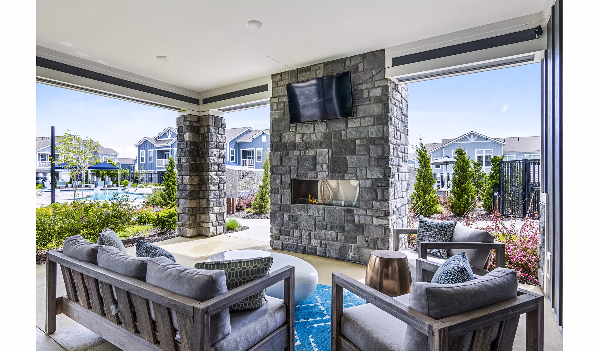 Fire pit on a cozy patio at The Landing at Tiffany Springs Apartments, a luxury Greystar community offering relaxation and outdoor enjoyment