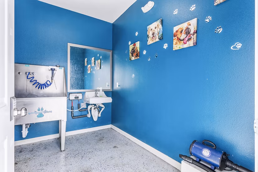Convenient dog wash station at The Landing at Tiffany Springs Apartments, offering luxury pet amenities for residents