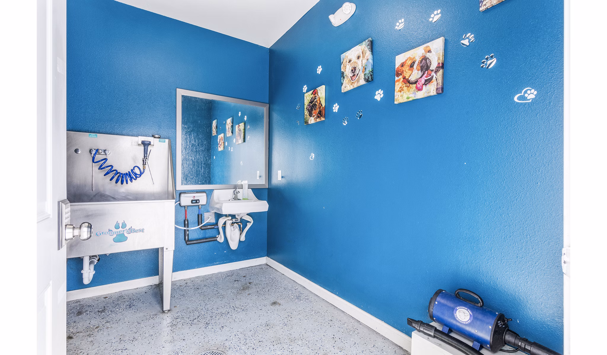 Convenient dog wash station at The Landing at Tiffany Springs Apartments, offering luxury pet amenities for residents