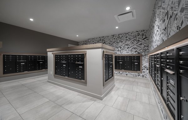 Secure package pickup room at The 6Hundred Apartments featuring modern design and organizational systems