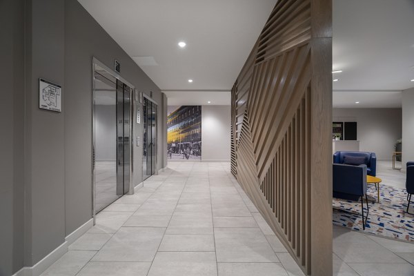 Clubhouse with modern decor at The 6Hundred Apartments featuring luxury seating and contemporary design elements