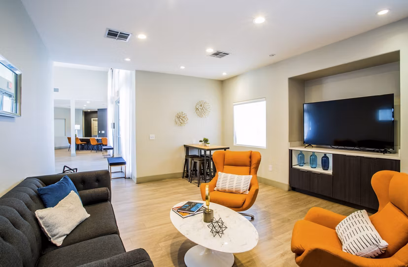 Clubhouse featuring modern amenities at Villas at 6300 Apartments