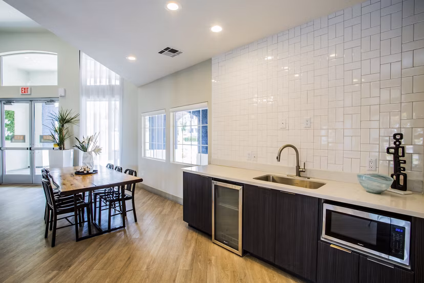 Modern clubhouse featuring stylish seating and entertainment options at Villas at 6300 Apartments