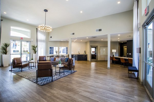 Modern clubhouse with stylish seating at Villas at 6300 Apartments, ideal for luxury gatherings and community events