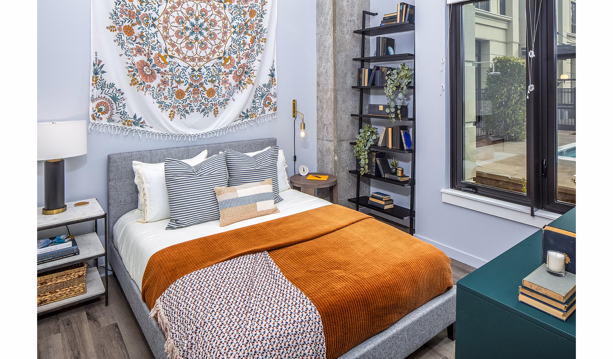 Cozy bedroom with modern decor at Mercato Grove Apartments
