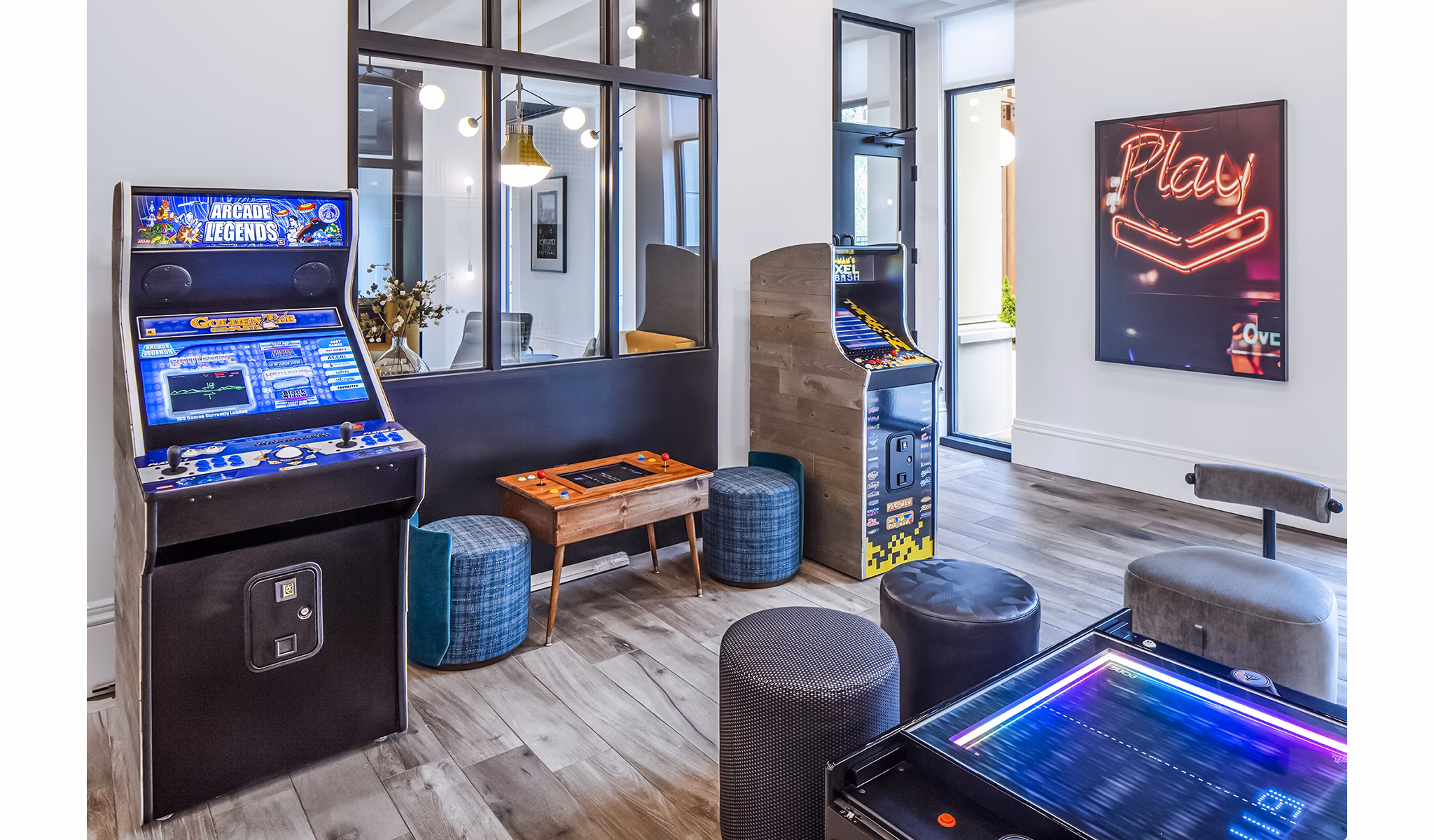 Game lounge with billiards and seating at Mercato Grove Apartments