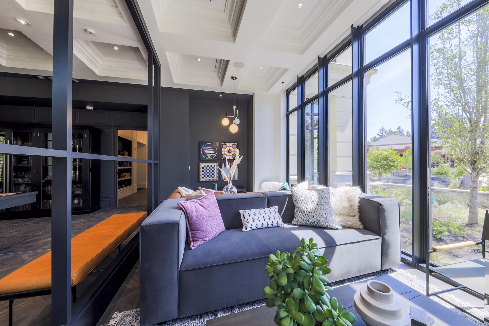 Clubhouse with modern furnishings and sleek design at Mercato Grove Apartments in Lake Oswego Perfect for social gatherings and group activities