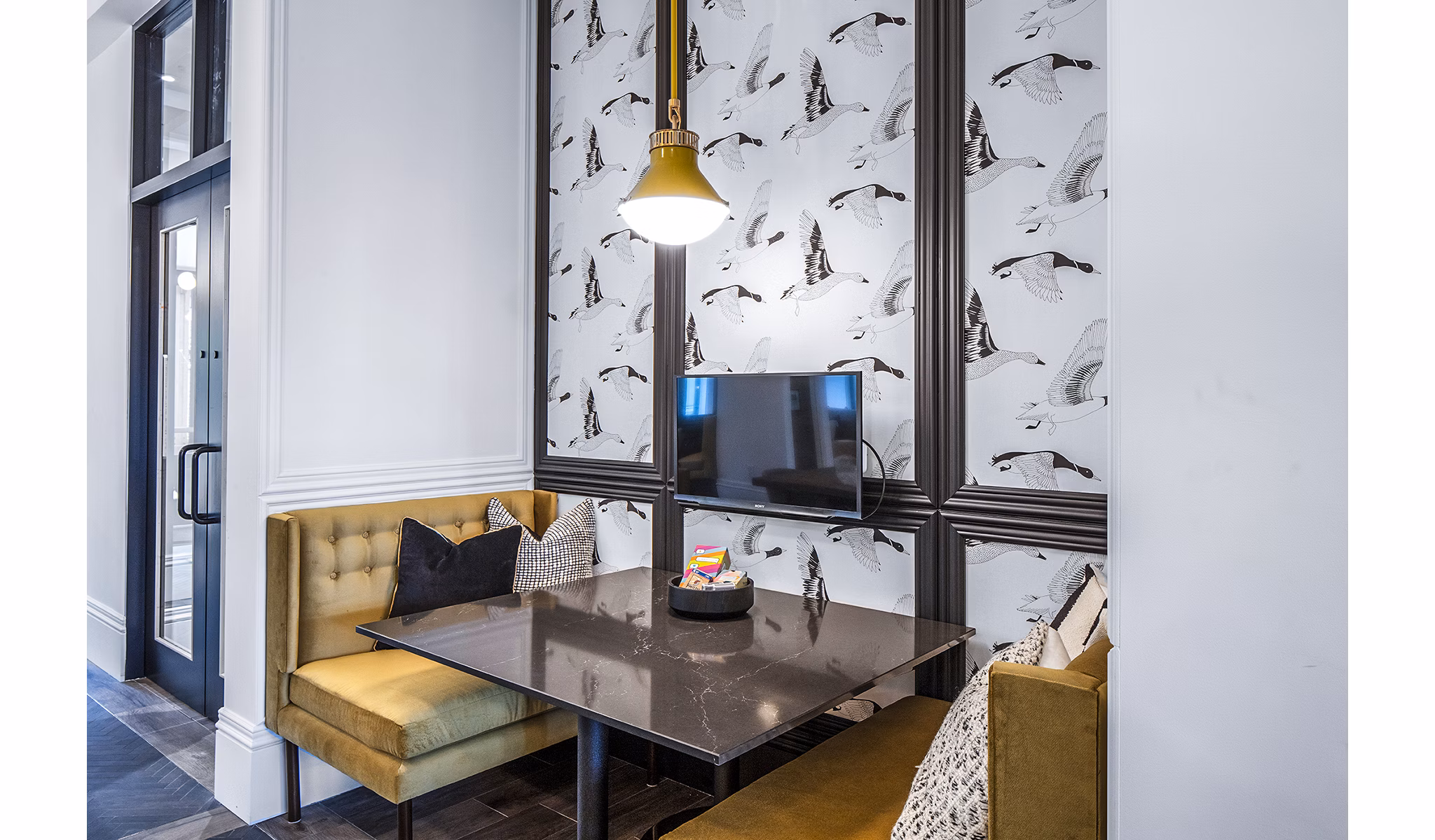 Luxurious clubhouse lobby featuring modern dÃ©cor at Mercato Grove Apartments, creating a welcoming ambiance for residents and guests