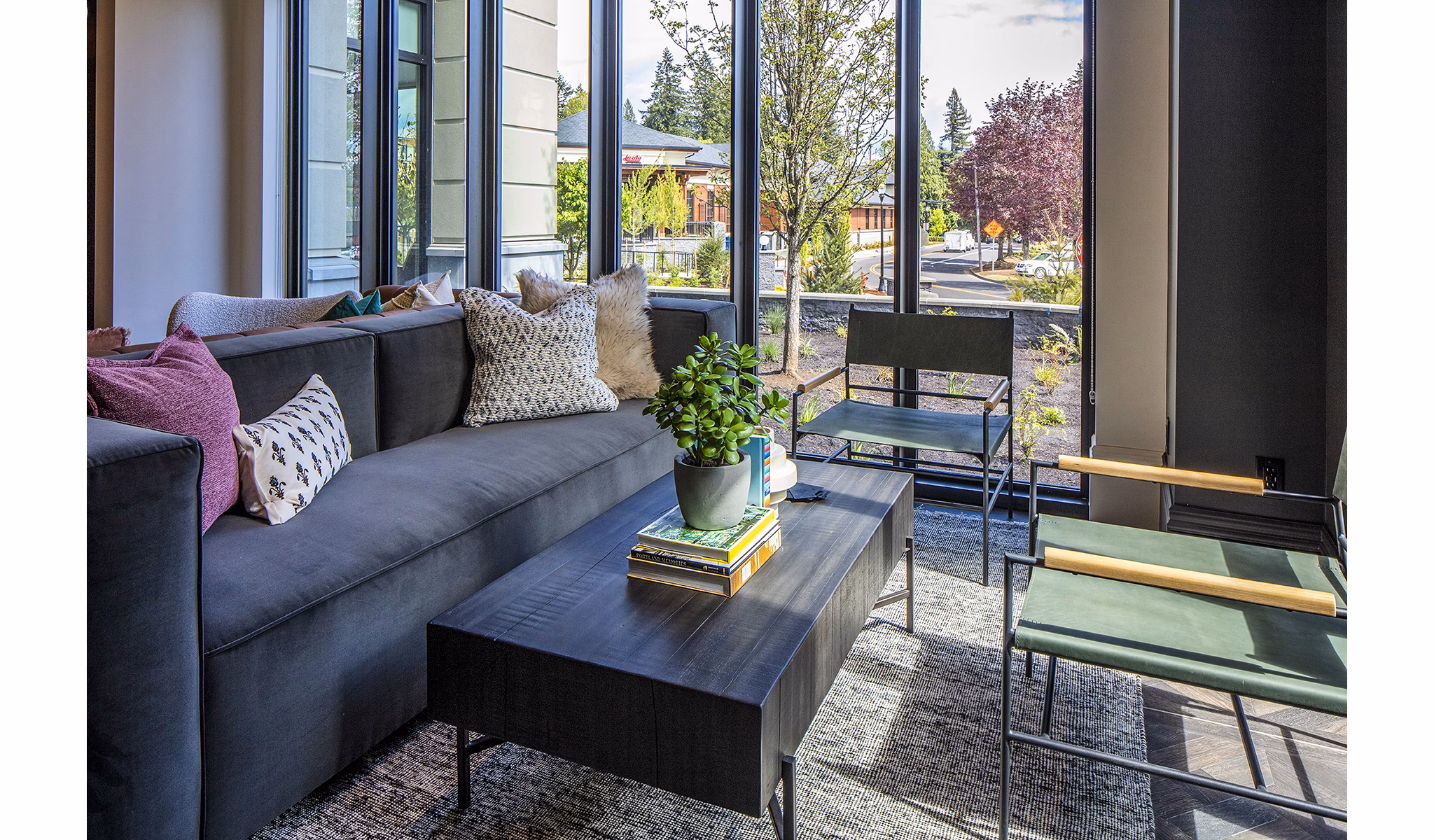Lobby with modern design and seating at Mercato Grove Apartments