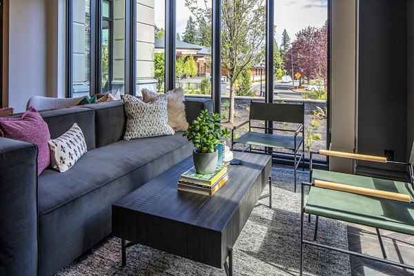 Lobby with modern design and seating at Mercato Grove Apartments