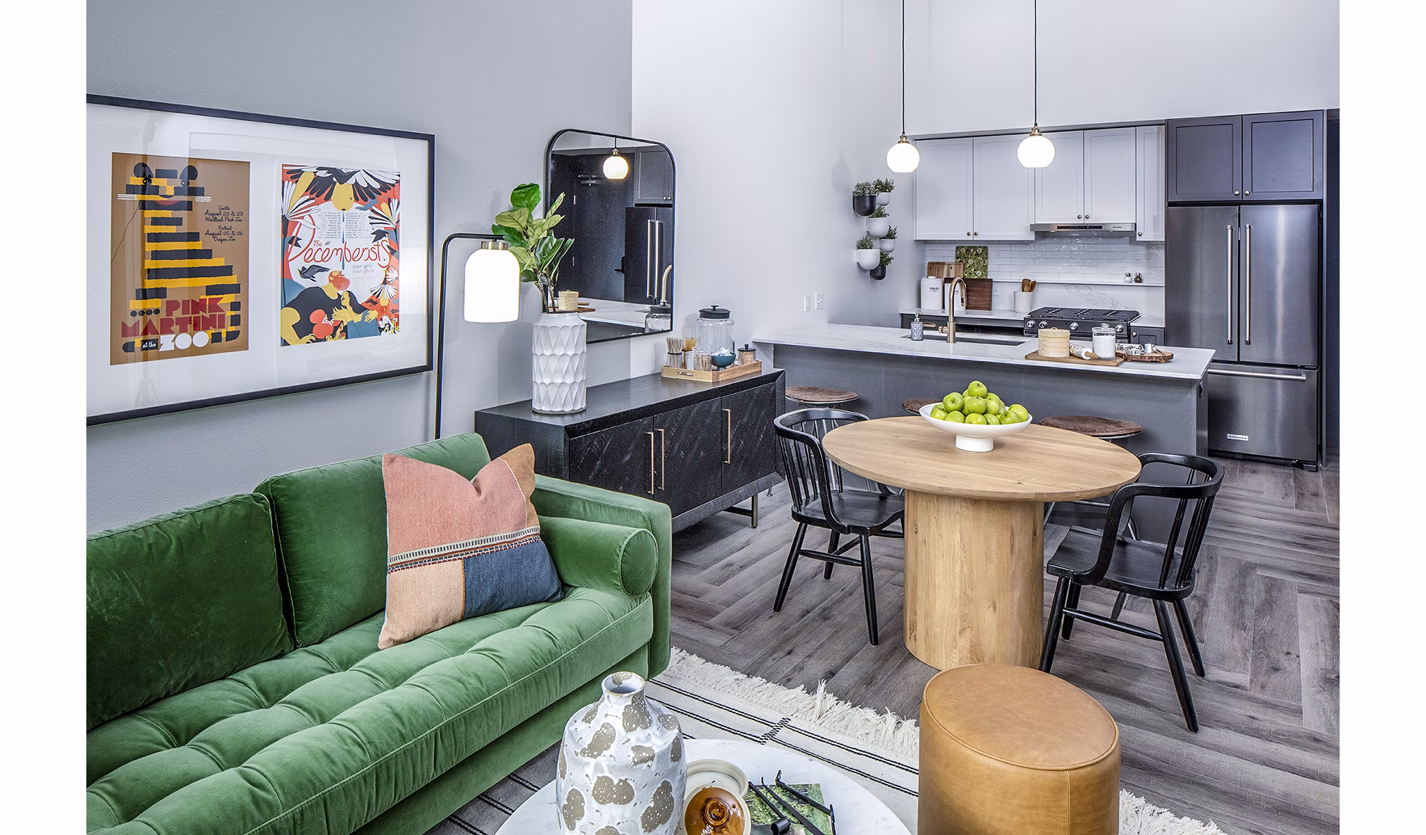 Dining room with modern furnishings and stylish lighting at Mercato Grove Apartments