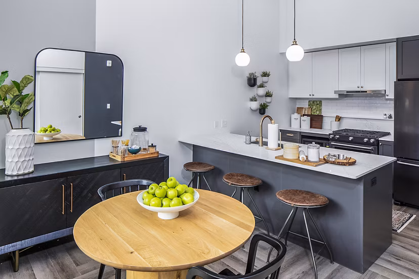 Elegant dining room with modern furnishings at Mercato Grove Apartments