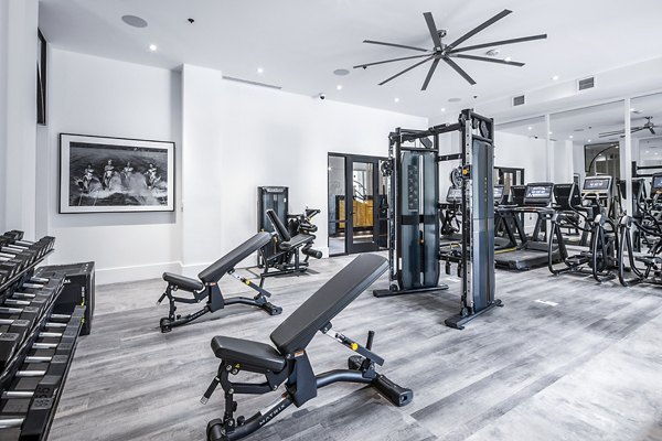 Modern fitness center with advanced equipment at Mercato Grove Apartments in Greystar community