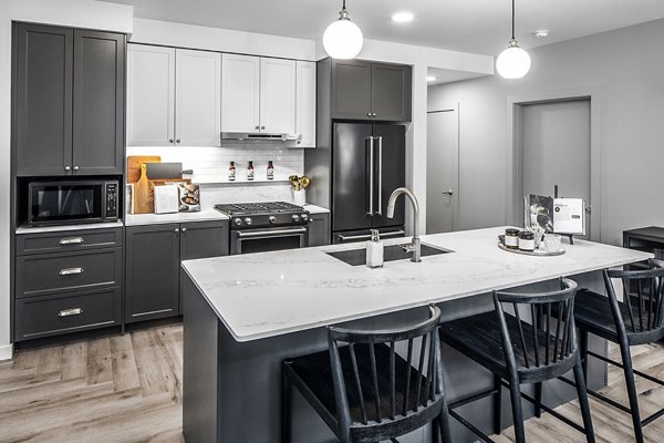Spacious kitchen with modern appliances at Mercato Grove Apartments