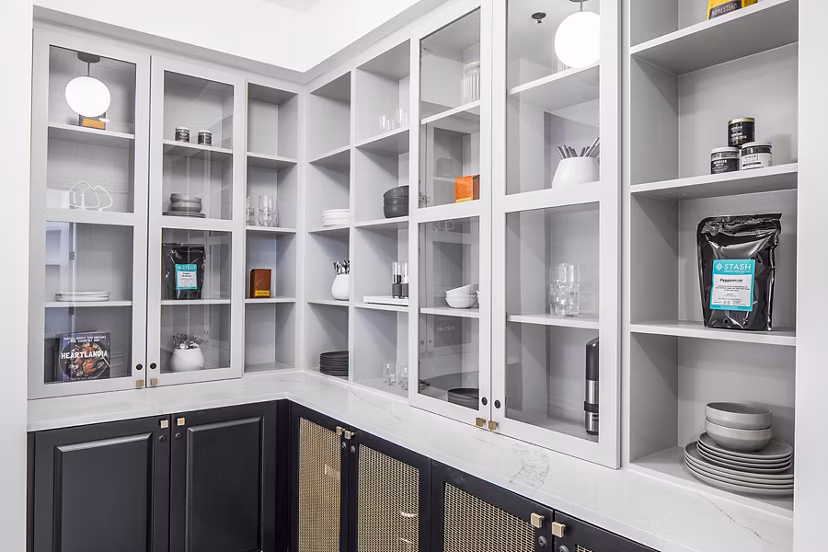 Modern kitchen with stainless steel appliances at Mercato Grove Apartments in Lake Oswego, offering stylish luxury apartment living