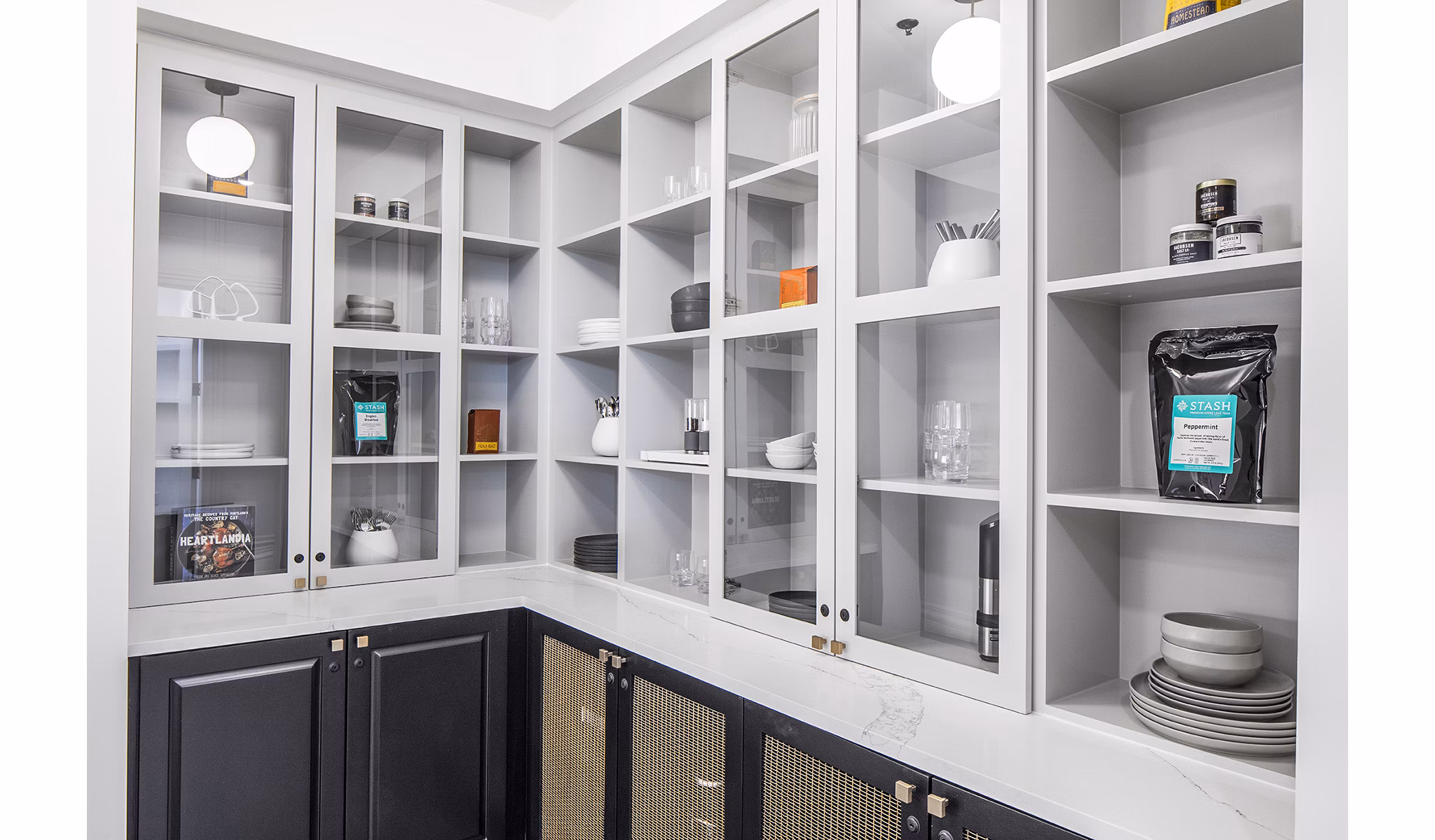 Modern kitchen with stainless steel appliances at Mercato Grove Apartments in Lake Oswego, offering stylish luxury apartment living