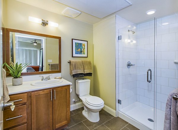 Modern bathroom featuring sleek fixtures at Everleigh Central Park Apartments