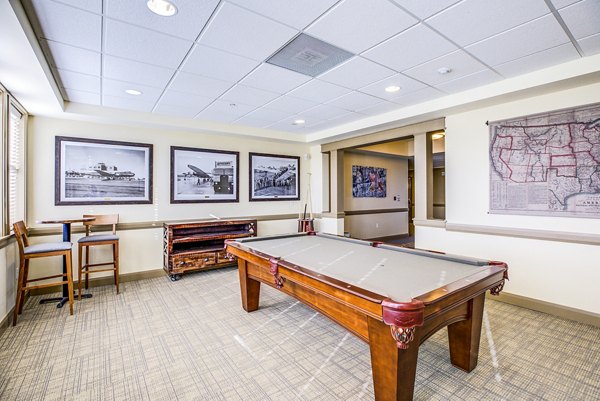 clubhouse game room at Everleigh Central Park Apartments