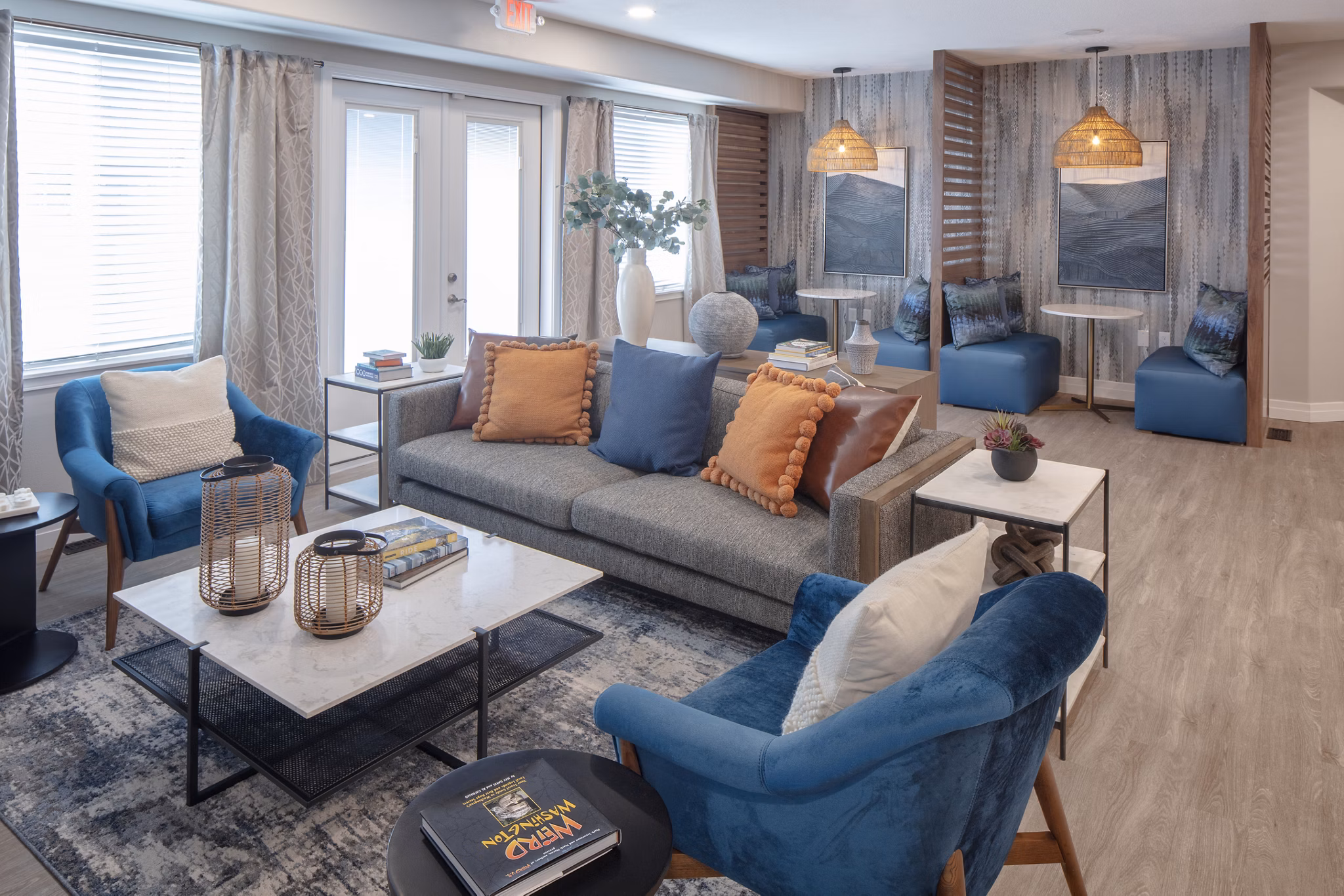 Contemporary clubhouse with lounge seating at Avana Evergreen Apartments, ideal for social gatherings and events