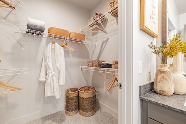 Walk-in closet with ample shelving and storage at Elan Keller Ranch Apartments