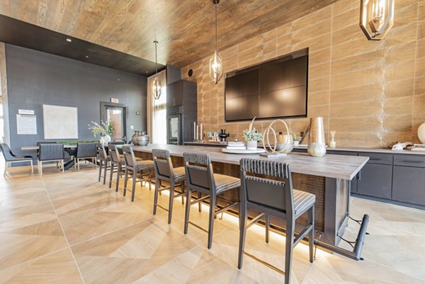 Clubhouse featuring modern design and plush seating at Elan Keller Ranch Apartments, promoting luxury living in a community setting
