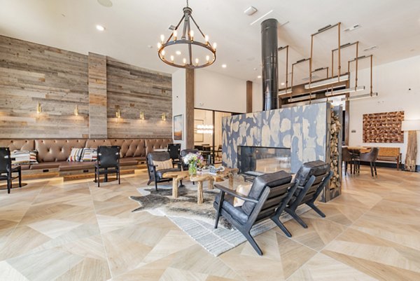 Clubhouse with modern decor and outdoor seating at Elan Keller Ranch Apartments