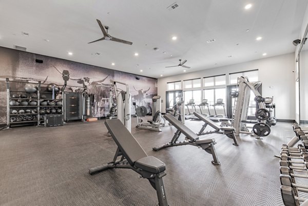 Modern fitness center with high-end equipment at Elan Keller Ranch Apartments: luxury apartments by Greystar