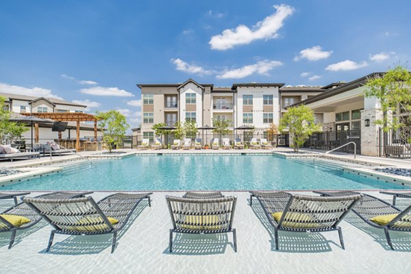 Luxury pool with sun deck at Elan Keller Ranch Apartments