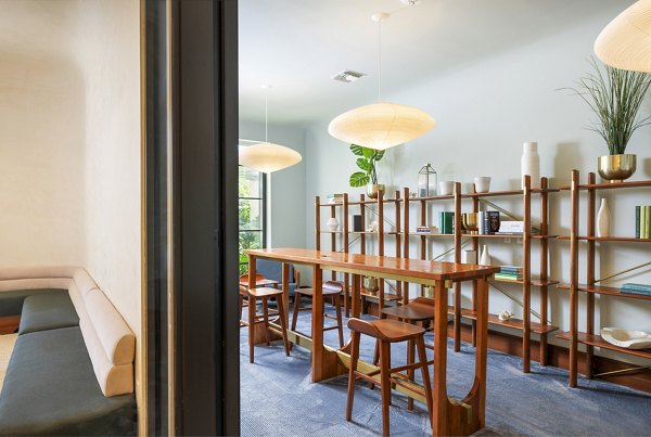 Clubhouse featuring modern design and cozy seating at Biscayne 112 Apartments
