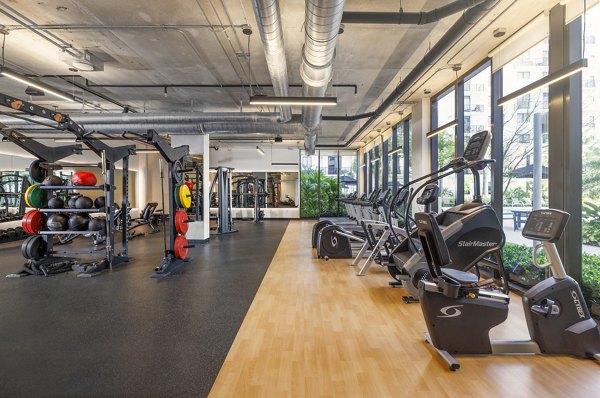 Modern fitness center with state-of-the-art equipment at Biscayne 112 Apartments