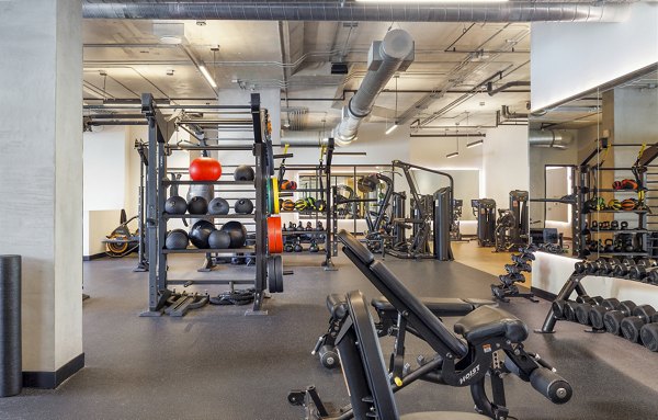 State-of-the-art fitness center equipped with modern exercise machines at Biscayne 112 Apartments