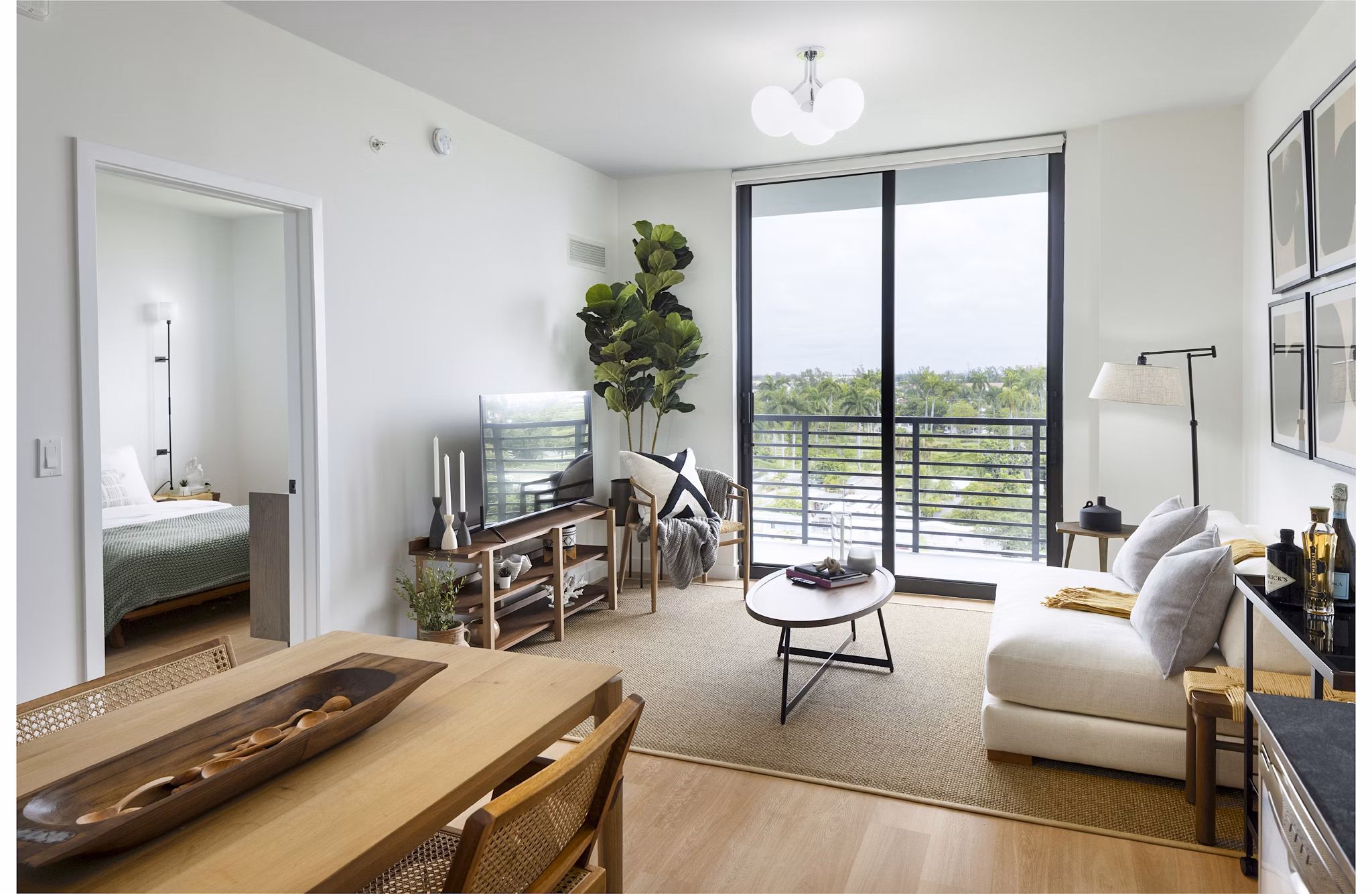 Spacious, modern living room with stylish furnishings in Biscayne 112 Apartments