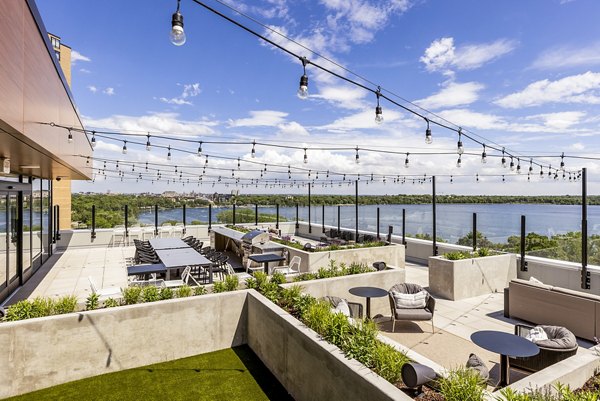 LakeHaus: Charming patio overlooking scenic views at luxury apartments on W Lake St, Minneapolis