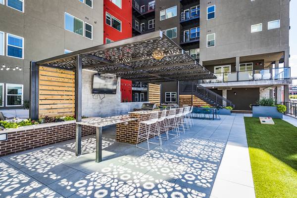 grill area/patio at Canvas on Blake Apartments