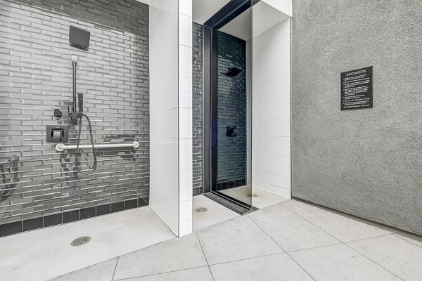pool area shower at Revo Apartments