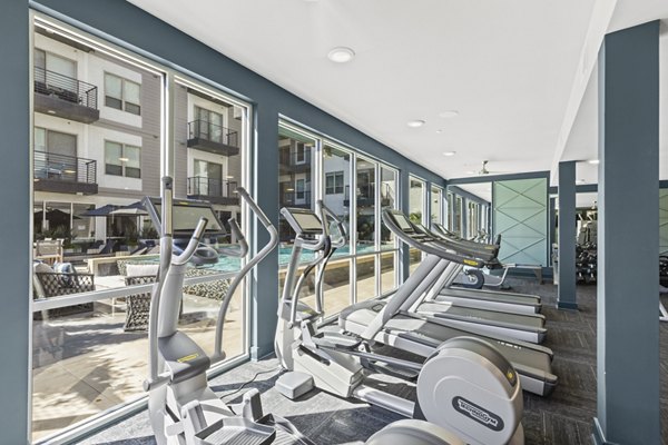 fitness center at ArtHaus 2828 Apartments 