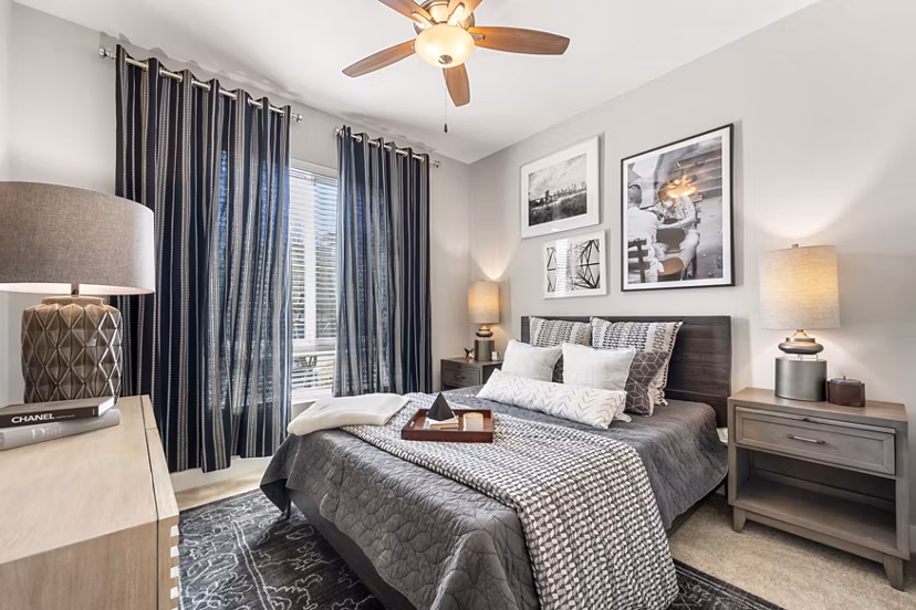 Cozy bedroom with modern decor at Maxwell on 66th Apartments