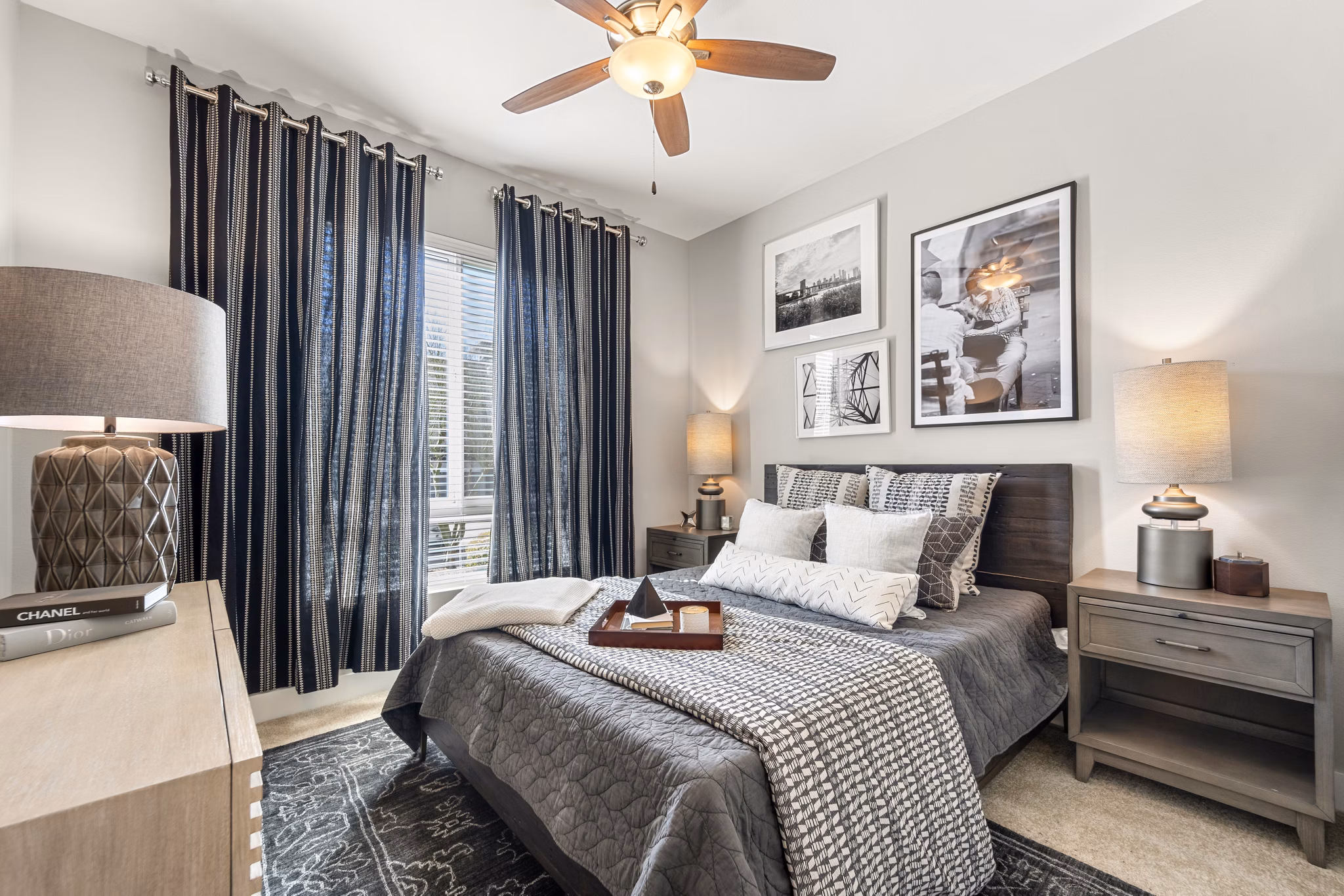 Cozy bedroom with modern decor at Maxwell on 66th Apartments