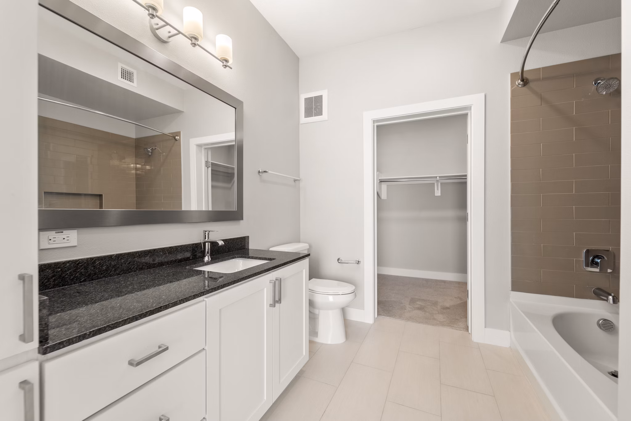 Modern bathroom with elegant fixtures at Maxwell on 66th Apartments