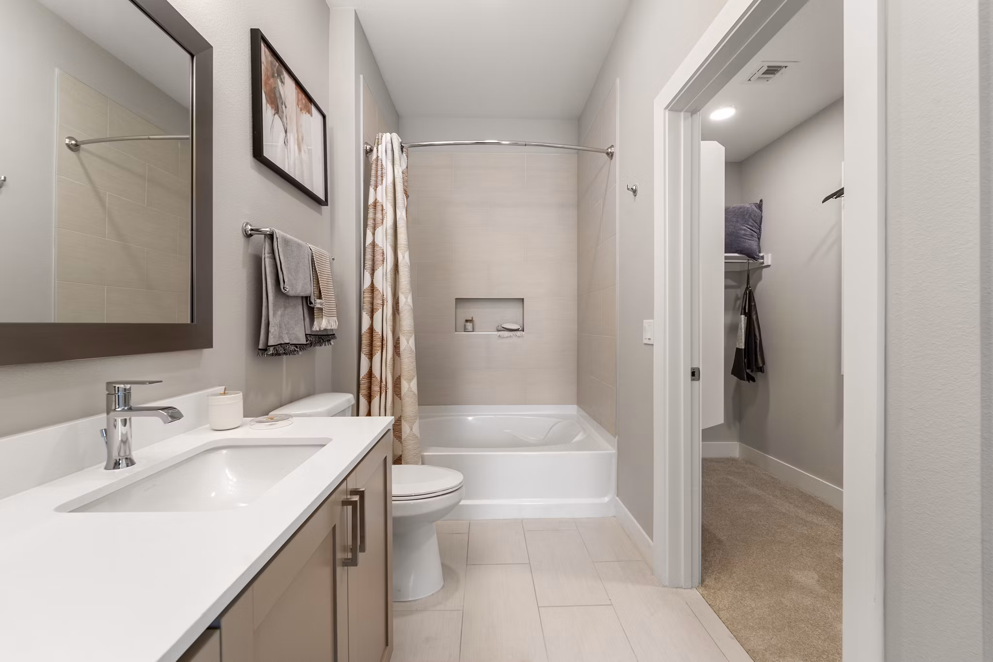 Elegant bathroom with modern fixtures at Maxwell on 66th Apartments
